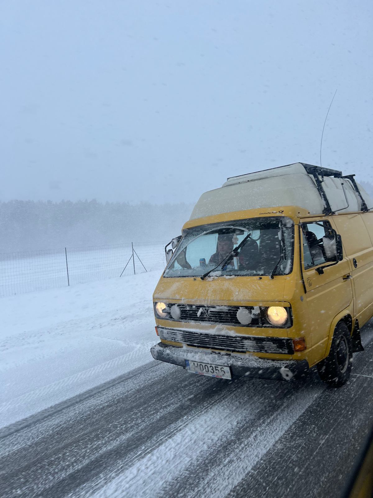 Birbi van on a snowy road — old vans meet real weather